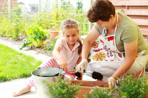 Front view of a gardener starting work in an urban garden